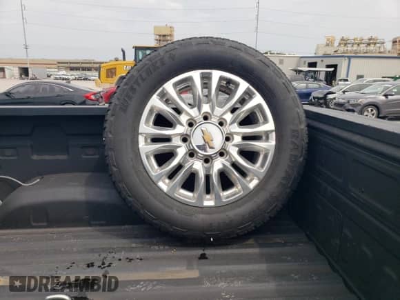 2022 Chevrolet Silverado 2500HD High Country with VIN 1GC4YREY3NF104709, listed as a Copart auction lot 65884885 with 121,818 mi miles and Salvage title. Bid and sale history available at DreamBid. Image 12.