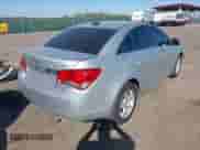 2016 Chevrolet Cruze LT z VIN 1G1PE5SB9G7194405, wystawiony jako IAAI lot #43367563 z przebiegiem 99 779 mil mil oraz . Historia ofert i sprzedaży dostępna na DreamBid. Obrazek 4.