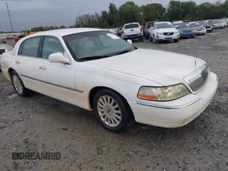 ✅ 2005 Lincoln Town Car Signature • VIN: 1LNHM81W05Y643994 • Лот: 43420301. Опубликован ранее на IAAI с пробегом 148 318 миль. Бесплатный доступ к архиву аукционных продаж из США и подробный отчёт об истории автомобиля на DreamBid. Изображение 1.