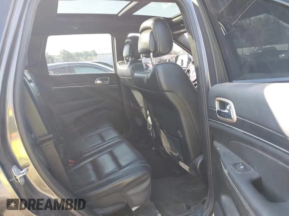 ✅ 2014 Jeep Grand Cherokee Overland • VIN: 1C4RJFCG2EC572628 • Lot: 42874326. Listed on IAAI with 129,145 mi. Free auction sales archive from the USA and detailed vehicle history report at DreamBid. Image 8.