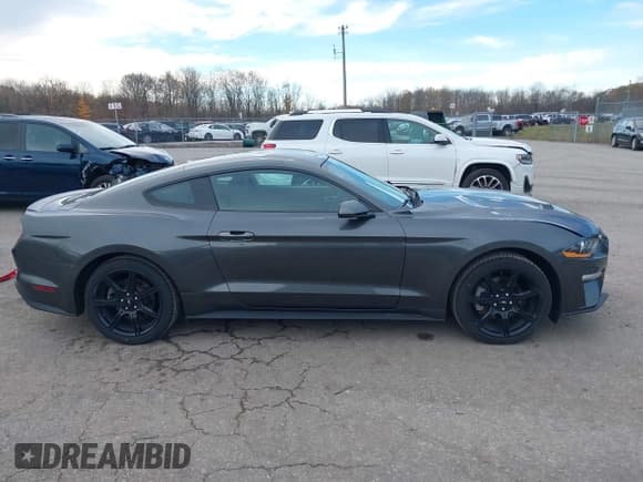 ✅ 2018 Ford Mustang EcoBoost • VIN: 1FA6P8TH0J5103113 • Lot: 43645805. Listed on IAAI with 52,797 mi. Free auction sales archive from the USA and detailed vehicle history report at DreamBid. Image 13.