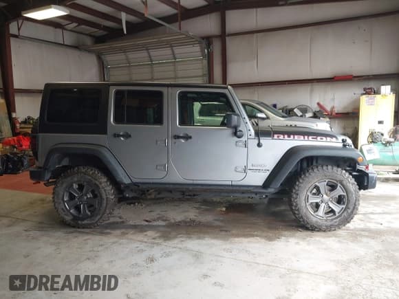 ✅ 2017 Jeep Wrangler Unlimited Rubicon Recon • VIN: 1C4BJWFG5HL687757 • Lot: 42367095. Listed on IAAI with 48,441 mi. Free auction sales archive from the USA and detailed vehicle history report at DreamBid. Image 13.