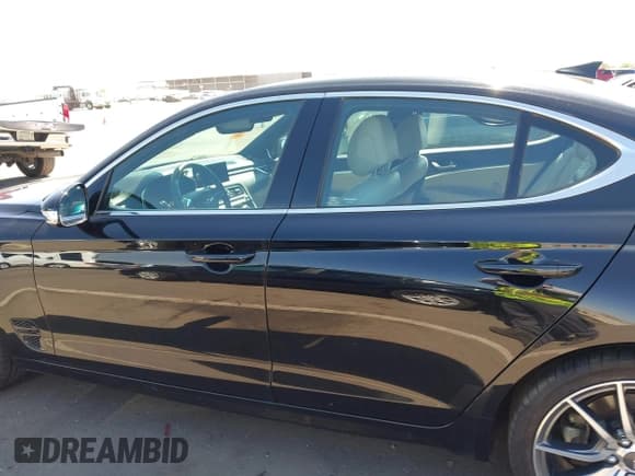 ✅ 2023 Genesis G70 2.0T • VIN: KMTG34TA3PU132398 • Lot: 42497066. Listed on IAAI with 34,759 mi. Free auction sales archive from the USA and detailed vehicle history report at DreamBid. Image 14.