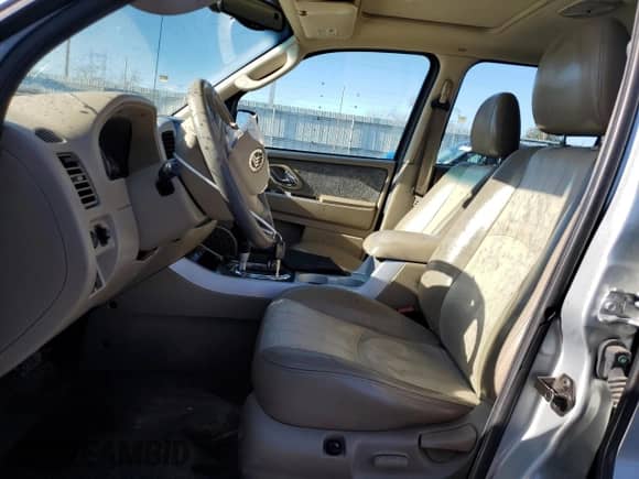 2006 Mercury Mariner Luxury с VIN 4M2CU56176KJ09951, выставлен на аукционе Copart как лот 42716485 с пробегом 144 615 миль миль и Списание • Salvage title. История ставок и продаж доступна на DreamBid. Изображение 7.