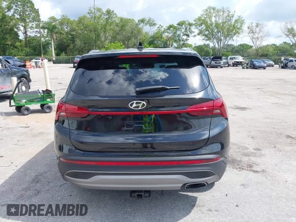 ✅ 2021 Hyundai Santa Fe SE • VIN: 5NMS14AJ0MH332918 • Lot: 42365534. Listed on IAAI with 58,720 mi. Free auction sales archive from the USA and detailed vehicle history report at DreamBid. Image 16.