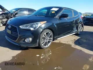 2017 Hyundai Veloster Turbo z VIN KMHTC6AE3HU315926, wystawiony jako IAAI lot #43358285 z przebiegiem 111 638 mil mil oraz . Historia ofert i sprzedaży dostępna na DreamBid. Obrazek 2.