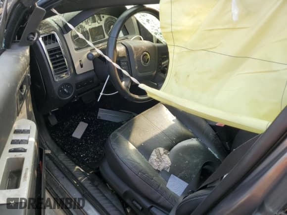 ✅ 2009 Mercury Mariner Premier • VIN: 4M2CU97G39KJ16748 • Lot: 60787005. Wystawiony na Copart z przebiegiem 191 206 mil. Bezpłatny archiwum sprzedaży aukcyjnych z USA i szczegółowy raport historii pojazdu na DreamBid. Zdjęcie 8.