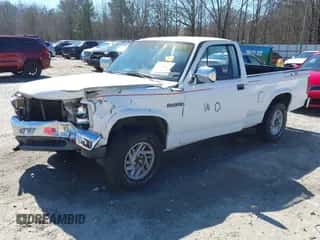 1993 Dodge Dakota S z VIN 1B7FL26X9PS101795, wystawiony jako IAAI lot #41745547 z przebiegiem 84 172 mil mil oraz . Historia ofert i sprzedaży dostępna na DreamBid. Obrazek 2.