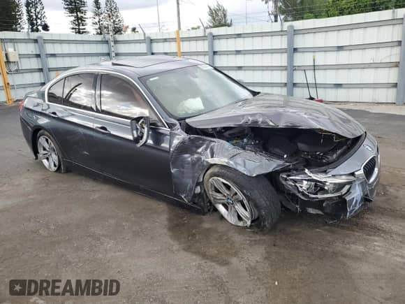 2018 BMW 3 Series 330i xDrive with VIN WBA8D9G57JNU70847, listed as a Copart auction lot 82004405 with 106,746 mi miles and Salvage title. Bid and sale history available at DreamBid. Image 4.