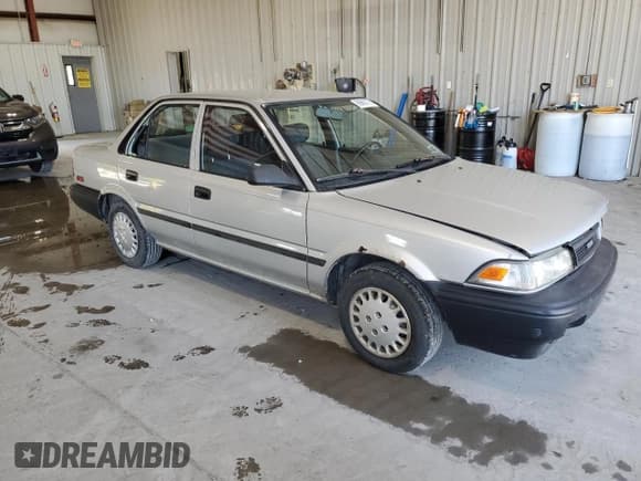 ✅ 1990 Toyota Corolla • VIN: 2T1AE94A6LC041577 • Lot: 69663775. Listed on Copart with 115,282 mi. Free auction sales archive from the USA and detailed vehicle history report at DreamBid. Image 4.