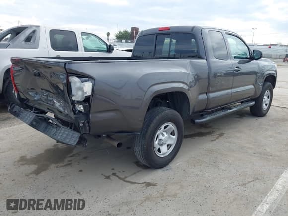 ✅ 2020 Toyota Tacoma SR • VIN: 3TYRX5GN4LT000610 • Lot: 43685750. Listed on IAAI with 64,466 mi. Free auction sales archive from the USA and detailed vehicle history report at DreamBid. Image 4.
