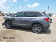 ✅ 2021 Honda Passport EX-L • VIN: 5FNYF8H52MB024467 • Lot: 42427539. Listed on IAAI with 75,652 mi. Free auction sales archive from the USA and detailed vehicle history report at DreamBid. Image 14.