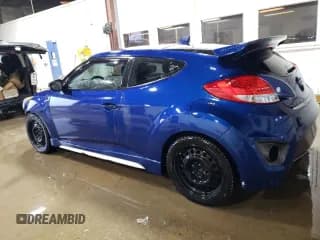 ✅ 2016 Hyundai Veloster Turbo • VIN: KMHTC6AE9GU273115 • Lot: 86998524. Wystawiony na Copart z przebiegiem 62 285 mil. Bezpłatny archiwum sprzedaży aukcyjnych z USA i szczegółowy raport historii pojazdu na DreamBid. Zdjęcie 2.