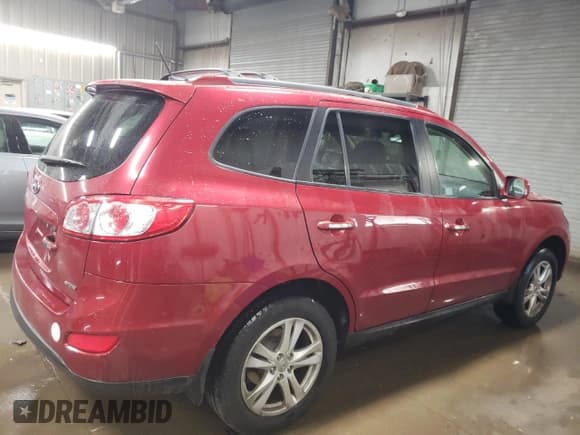 ✅ 2012 Hyundai Santa Fe Limited • VIN: 5XYZK4AG4CG112240 • Lot: 77424994. Listed on Copart with 217,853 mi. Free auction sales archive from the USA and detailed vehicle history report at DreamBid. Image 3.