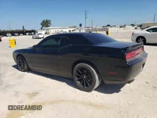 2013 Dodge Challenger R/T Plus z VIN 2C3CDYBT2DH604923, wystawiony jako Copart lot #66301564 z przebiegiem Nie podano mil oraz Szkoda całkowita • Salvage title. Historia ofert i sprzedaży dostępna na DreamBid. Obrazek 2.