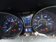 ✅ 2013 Hyundai Veloster Turbo • VIN: KMHTC6AE8DU096682 • Lot: 42974837. Wystawiony na IAAI z przebiegiem 77 365 mil. Bezpłatny archiwum sprzedaży aukcyjnych z USA i szczegółowy raport historii pojazdu na DreamBid. Zdjęcie 7.