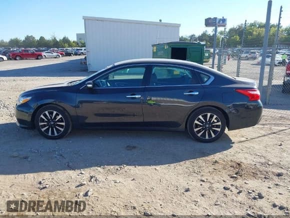 ✅ 2018 Nissan Altima S • VIN: 1N4AL3APXJC202648 • Лот: 42628634. Опубликован ранее на IAAI с пробегом 129 601 миль. Бесплатный доступ к архиву аукционных продаж из США и подробный отчёт об истории автомобиля на DreamBid. Изображение 14.