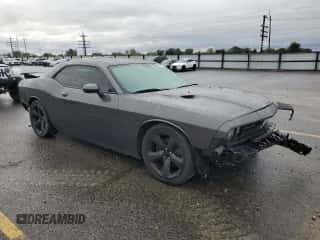 2014 Dodge Challenger R/T Plus z VIN 2C3CDYBT2EH247695, wystawiony jako Copart lot #84817345 z przebiegiem 52 335 mil mil oraz Szkoda całkowita • Salvage title. Historia ofert i sprzedaży dostępna na DreamBid. Obrazek 4.