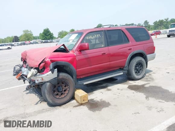 ✅ 1997 Toyota 4Runner SR5 • VIN: JT3HN86R7V0107227 • Lot: 42460449. Listed on IAAI with 297,419 mi. Free auction sales archive from the USA and detailed vehicle history report at DreamBid. Image 2.
