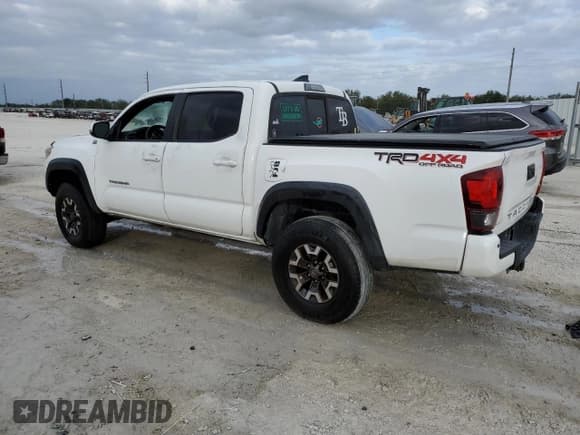 ✅ 2018 Toyota Tacoma TRD Sport • VIN: 3TMCZ5AN3JM174668 • Lot: 87486544. Listed on Copart with 217,834 mi. Free auction sales archive from the USA and detailed vehicle history report at DreamBid. Image 2.