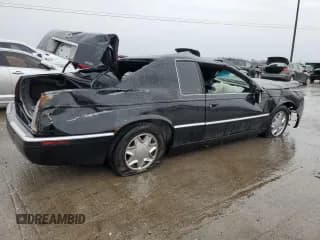 ✅ 2000 Cadillac Eldorado • VIN: 1G6EL12Y7YU190697 • Лот: 70741434. Опубликован ранее на Copart с пробегом Не указан. Бесплатный доступ к архиву аукционных продаж из США и подробный отчёт об истории автомобиля на DreamBid. Изображение 3.