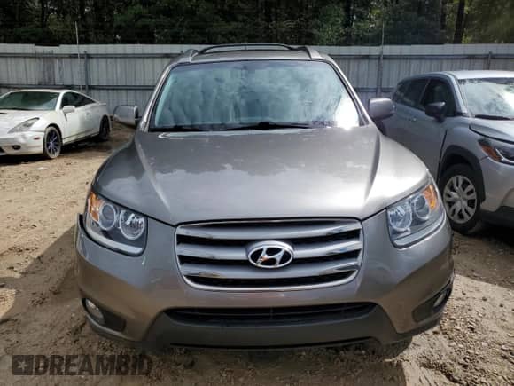 2012 Hyundai Santa Fe Limited с VIN 5XYZK4AG4CG136277, выставлен на аукционе Copart как лот 71356364 с пробегом 77 940 миль миль и На запчасти • Non repairable. История ставок и продаж доступна на DreamBid. Изображение 5.
