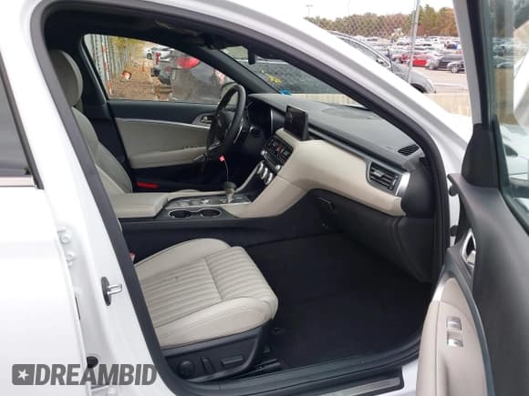 ✅ 2023 Genesis G70 2.0T • VIN: KMTG34TA5PU134282 • Lot: 43545957. Listed on IAAI with 21,154 mi. Free auction sales archive from the USA and detailed vehicle history report at DreamBid. Image 5.