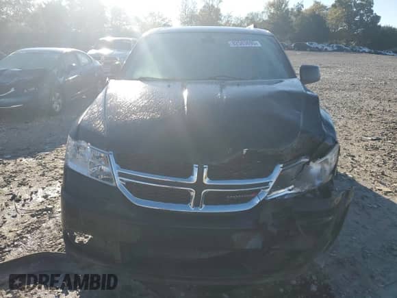 2018 Dodge Journey SE with VIN 3C4PDCAB0JT427879, listed as a Copart auction lot 82583695 with 80,549 mi miles and Salvage title. Bid and sale history available at DreamBid. Image 5.