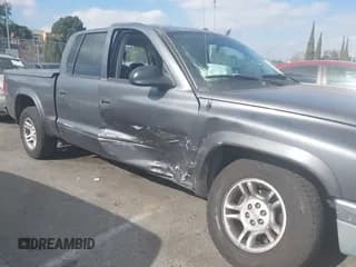 ✅ 2003 Dodge Dakota SLT • VIN: 1D7HL48N23S247441 • Lot: 41359296. Wystawiony na IAAI z przebiegiem 58 414 mil. Bezpłatny archiwum sprzedaży aukcyjnych z USA i szczegółowy raport historii pojazdu na DreamBid. Zdjęcie 6.