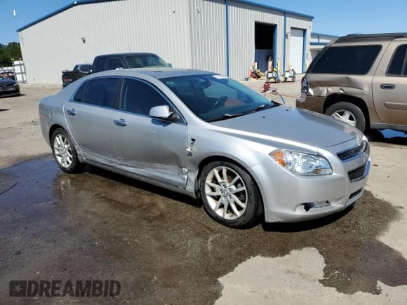 ✅ 2008 Chevrolet Malibu LTZ • VIN: 1G1ZK57758F257299 • Lot: 74119984. Listed on Copart with 184,109 mi. Free auction sales archive from the USA and detailed vehicle history report at DreamBid. Image 4.