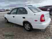 2002 Hyundai Accent GL z VIN KMHCG45C82U358523, wystawiony jako Copart lot #48247575 z przebiegiem 164 869 mil mil oraz Szkoda całkowita • Salvage title. Historia ofert i sprzedaży dostępna na DreamBid. Obrazek 2.