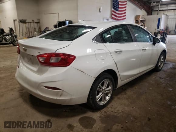 ✅ 2017 Chevrolet Cruze LT • VIN: 1G1BE5SM5H7178229 • Lot: 50365443. Listed on Copart with 192,376 mi. Free auction sales archive from the USA and detailed vehicle history report at DreamBid. Image 3.