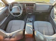 ✅ 2001 Jeep Cherokee Sport • VIN: 1J4FF48S61L585845 • Lot: 94385795. Listed on Copart with 110,014 mi. Free auction sales archive from the USA and detailed vehicle history report at DreamBid. Image 8.