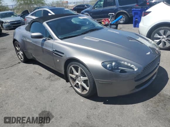 ✅ 2007 Aston Martin Vantage • VIN: SCFBF04B27GD06691 • Лот: 60060835. Опубликован ранее на Copart с пробегом 17 988 миль. Бесплатный доступ к архиву аукционных продаж из США и подробный отчёт об истории автомобиля на DreamBid. Изображение 4.