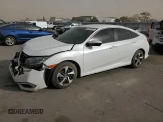 ✅ 2019 Honda Civic LX • VIN: 19XFC2F62KE205936 • Лот: 92505495. Опубликован ранее на Copart с пробегом 123 430 миль. Бесплатный доступ к архиву аукционных продаж из США и подробный отчёт об истории автомобиля на DreamBid. Изображение 1.