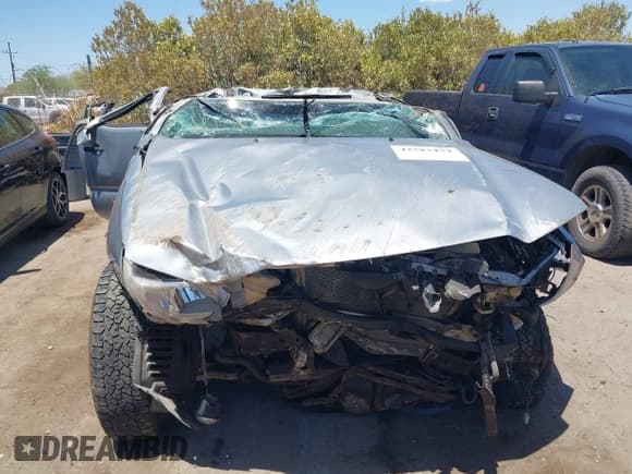 ✅ 2015 Toyota Tacoma PreRunner • VIN: 5TFKU4HNXFX005985 • Lot: 42583474. Listed on IAAI with 160,000 mi. Free auction sales archive from the USA and detailed vehicle history report at DreamBid. Image 12.