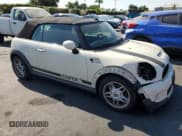 ✅ 2009 MINI Convertible S • VIN: WMWMS33509TY08040 • Lot: 64613975. Wystawiony na Copart z przebiegiem 124 938 mil. Bezpłatny archiwum sprzedaży aukcyjnych z USA i szczegółowy raport historii pojazdu na DreamBid. Zdjęcie 4.