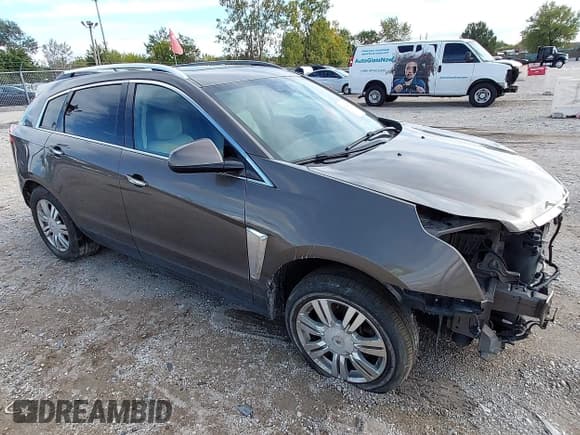 ✅ 2014 Cadillac SRX Luxury Collection • VIN: 3GYFNEE32ES587548 • Lot: 43298731. Listed on IAAI with 126,400 mi. Free auction sales archive from the USA and detailed vehicle history report at DreamBid. Image 1.
