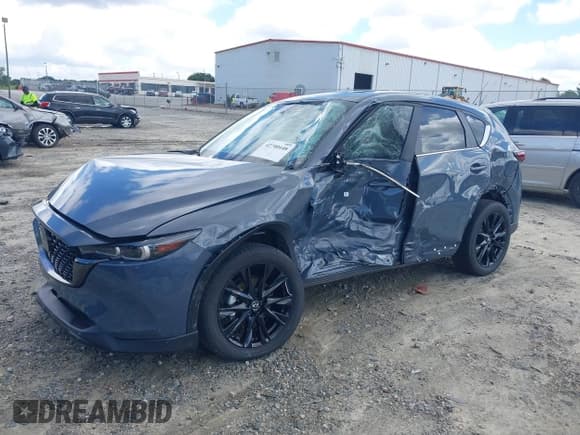 ✅ 2023 Mazda CX-5 S Carbon Edition • VIN: JM3KFBCM3P0262534 • Лот: 42740448. Опубликован ранее на IAAI с пробегом 10 257 миль. Бесплатный доступ к архиву аукционных продаж из США и подробный отчёт об истории автомобиля на DreamBid. Изображение 2.