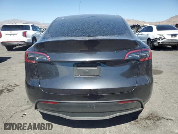 ✅ 2025 Tesla Model Y Long Range • VIN: 7SAYGDED2SF266130 • Lot: 80688045. Wystawiony na Copart z przebiegiem 7 556 mil. Bezpłatny archiwum sprzedaży aukcyjnych z USA i szczegółowy raport historii pojazdu na DreamBid. Zdjęcie 6.