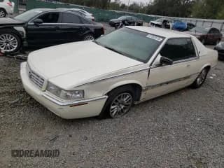 ✅ 2001 Cadillac Eldorado ESC • VIN: 1G6EL12Y41B101007 • Lot: 87553515. Wystawiony na Copart z przebiegiem 148 097 mil. Bezpłatny archiwum sprzedaży aukcyjnych z USA i szczegółowy raport historii pojazdu na DreamBid. Zdjęcie 1.