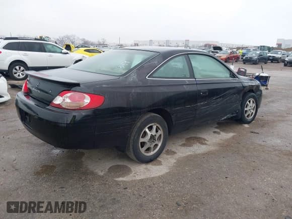 ✅ 2002 Toyota Solara SE • VIN: 2T1CE22P22C000370 • Lot: 41528835. Listed on IAAI with 215,628 mi. Free auction sales archive from the USA and detailed vehicle history report at DreamBid. Image 4.