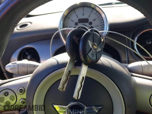 ✅ 2007 MINI Convertible S • VIN: WMWRH33517TJ45076 • Lot: 43778021. Listed on IAAI with 122,569 mi. Free auction sales archive from the USA and detailed vehicle history report at DreamBid. Image 11.