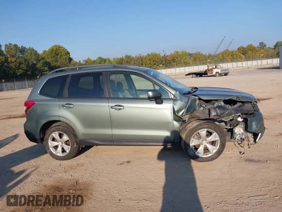 2015 Subaru Forester Premium z VIN JF2SJAGC5FH407495, wystawiony jako IAAI lot #43273554 z przebiegiem 197 237 mil mil oraz . Historia ofert i sprzedaży dostępna na DreamBid. Obrazek 13.