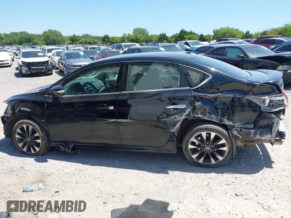 ✅ 2018 Nissan Sentra SV • VIN: 3N1AB7AP0JY216878 • Lot: 42842606. Wystawiony na IAAI z przebiegiem 121 296 mil. Bezpłatny archiwum sprzedaży aukcyjnych z USA i szczegółowy raport historii pojazdu na DreamBid. Zdjęcie 13.