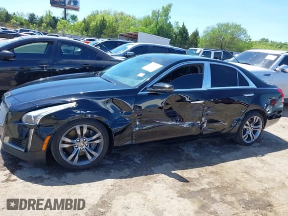 ✅ 2014 Cadillac CTS Vsport RWD • VIN: 1G6AU5S82E0145088 • Lot: 42026290. Wystawiony na IAAI z przebiegiem 95 368 mil. Bezpłatny archiwum sprzedaży aukcyjnych z USA i szczegółowy raport historii pojazdu na DreamBid. Zdjęcie 14.