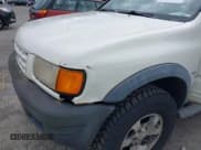 ✅ 1998 Isuzu Amigo • VIN: 4S2CM57W9W4373049 • Лот: 42599157. Опубликован ранее на IAAI с пробегом 140 368 миль. Бесплатный доступ к архиву аукционных продаж из США и подробный отчёт об истории автомобиля на DreamBid. Изображение 6.