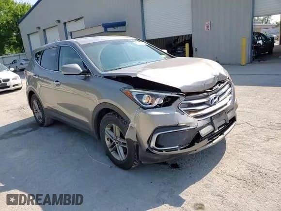 ✅ 2018 Hyundai Santa Fe 2.4L • VIN: 5XYZTDLBXJG560557 • Лот: 67072293. Опубликован ранее на Copart с пробегом 105 339 миль. Бесплатный доступ к архиву аукционных продаж из США и подробный отчёт об истории автомобиля на DreamBid. Изображение 12.