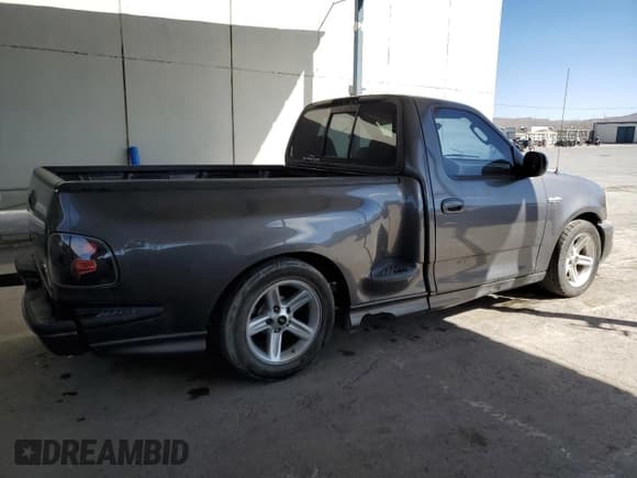 ✅ 2003 Ford F-150 Lightning • VIN: 2FTRF07313CA52692 • Lot: 44399975. Listed on Copart with 78,773 mi. Free auction sales archive from the USA and detailed vehicle history report at DreamBid. Image 3.