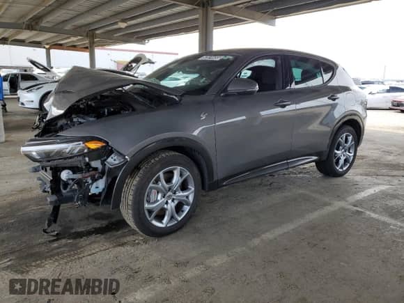 2024 Dodge Hornet R/T z VIN ZACPDFCW6R3A26249, wystawiony jako Copart lot #52874455 z przebiegiem 15 249 mil mil oraz Nie do naprawy • Non repairable. Historia ofert i sprzedaży dostępna na DreamBid. Obrazek 1.